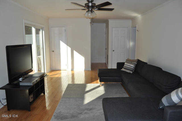 28 Rippowam Road, Unit A Cos Cob, CT 06807 - Photo 4 of 13 Family Room Adjacent to Kitchen