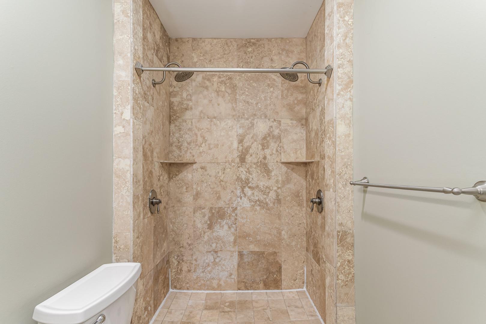 510 South Saunders Street Raleigh, NC 27603 - Photo 18 of 23 a bathroom with a shower and toilet
