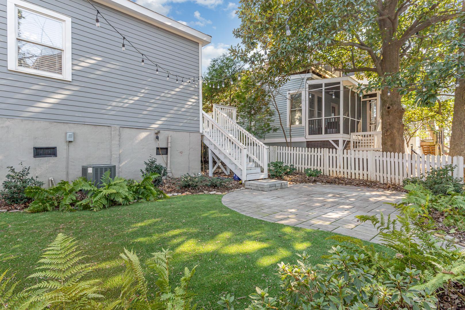 510 South Saunders Street Raleigh, NC 27603 - Photo 20 of 23 a view of a house with a yard and garden