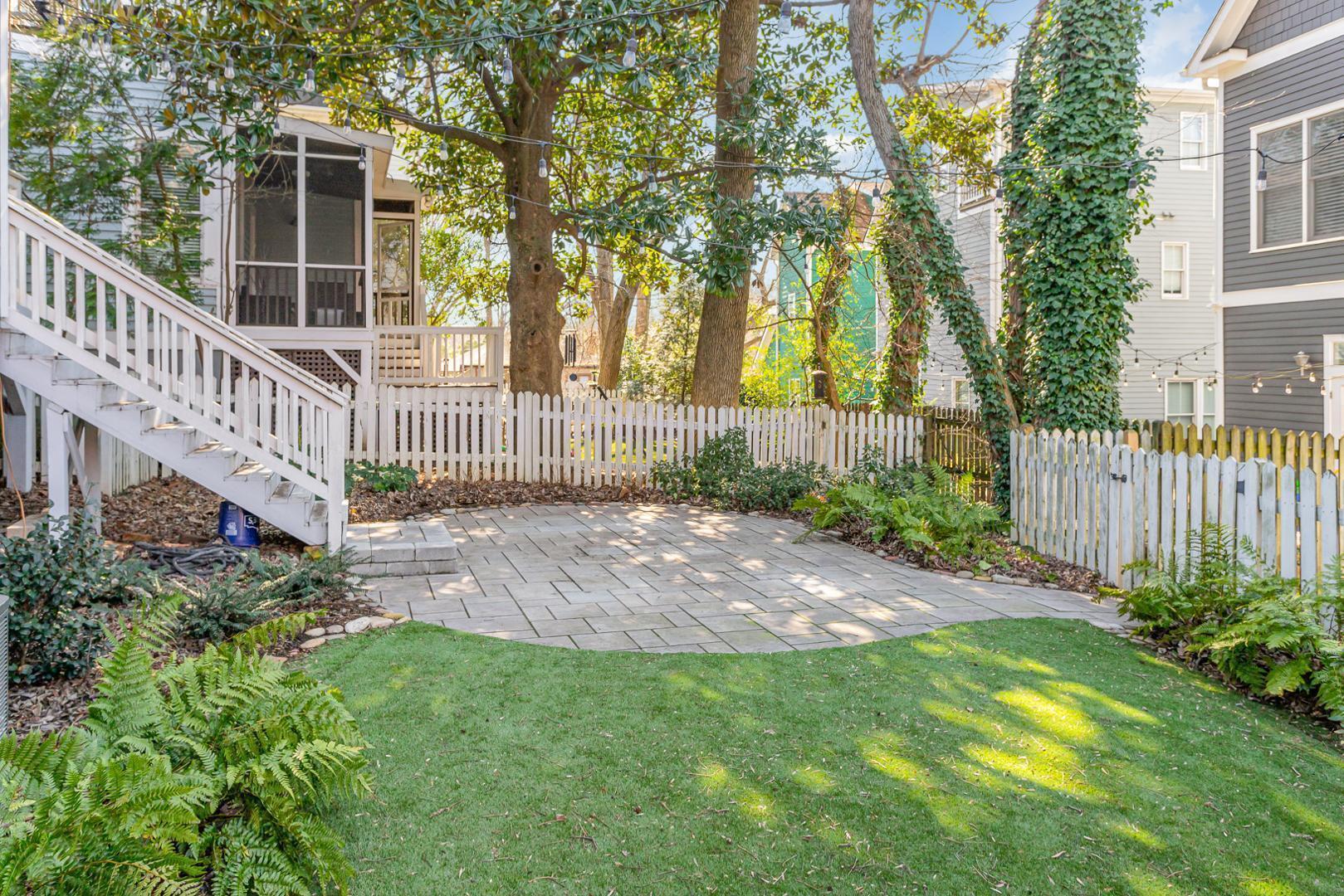 510 South Saunders Street Raleigh, NC 27603 - Photo 21 of 23 a view of a house with a yard and a fence
