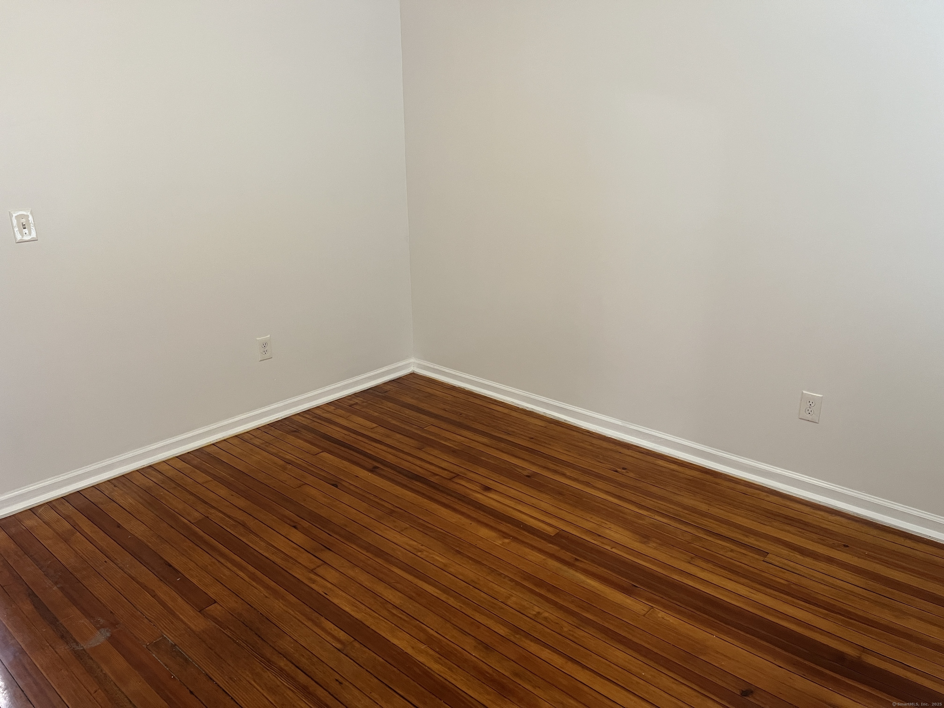 4 Magnolia Street, Unit 2 Hartford, CT 06112 - Photo 15 of 17 a view of room with wooden floor
