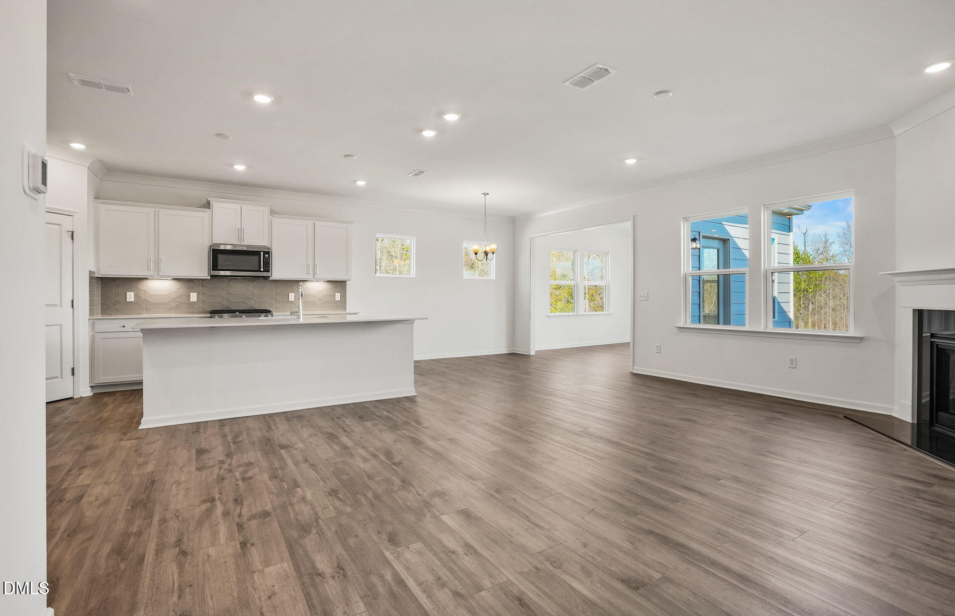 200 Armorial Court Willow Spring, NC 27592 - Photo 12 of 33 a view of kitchen with cabinets and wooden floor