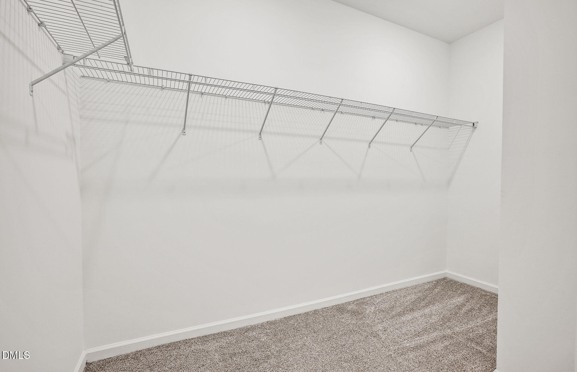 200 Armorial Court Willow Spring, NC 27592 - Photo 22 of 33 a view of a room with racks on the wall