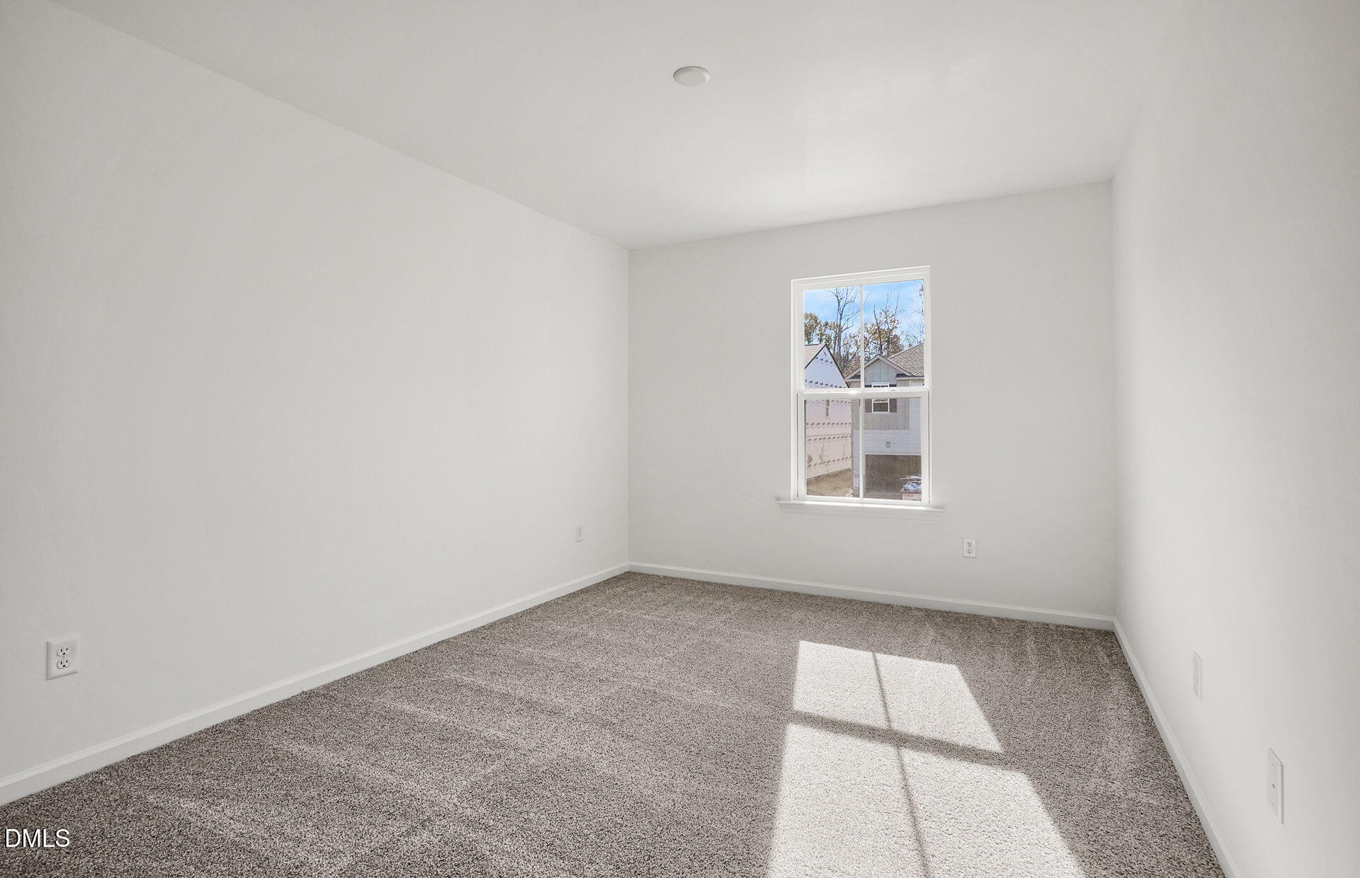 200 Armorial Court Willow Spring, NC 27592 - Photo 30 of 33 an empty room with a window