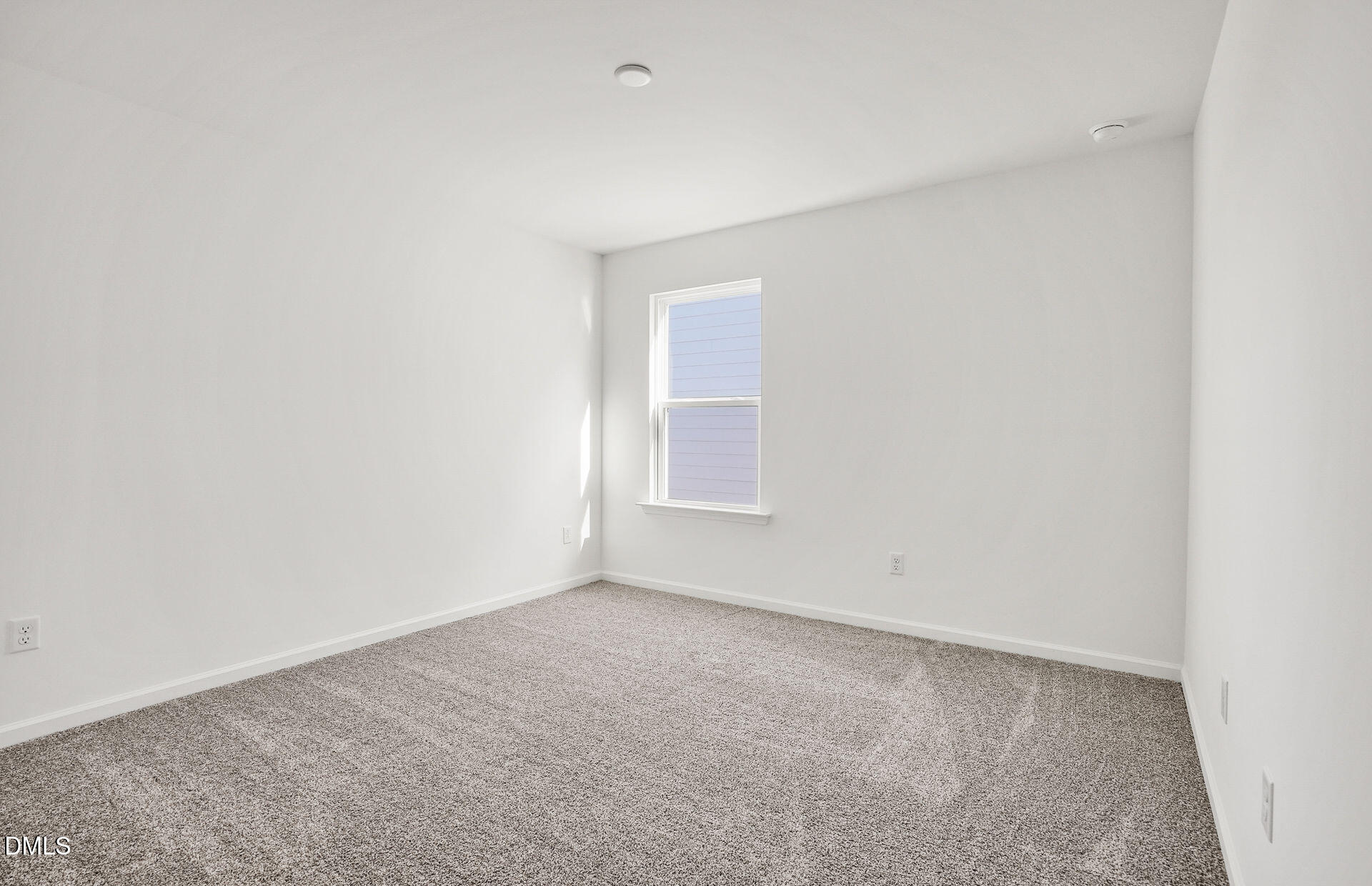 200 Armorial Court Willow Spring, NC 27592 - Photo 31 of 33 a view of an empty room with a window