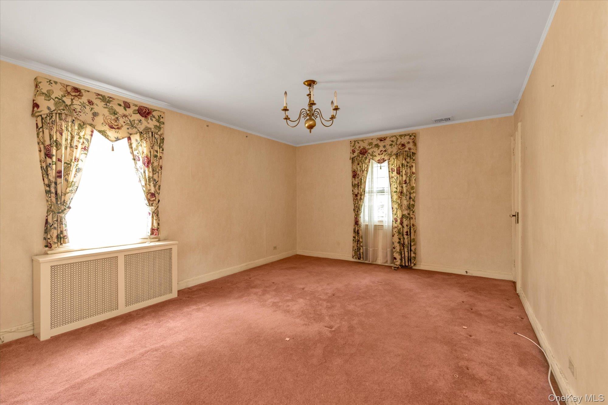 47-44 Glenwood Street Queens, NY 11362 - Photo 15 of 23 a view of an empty room with a window