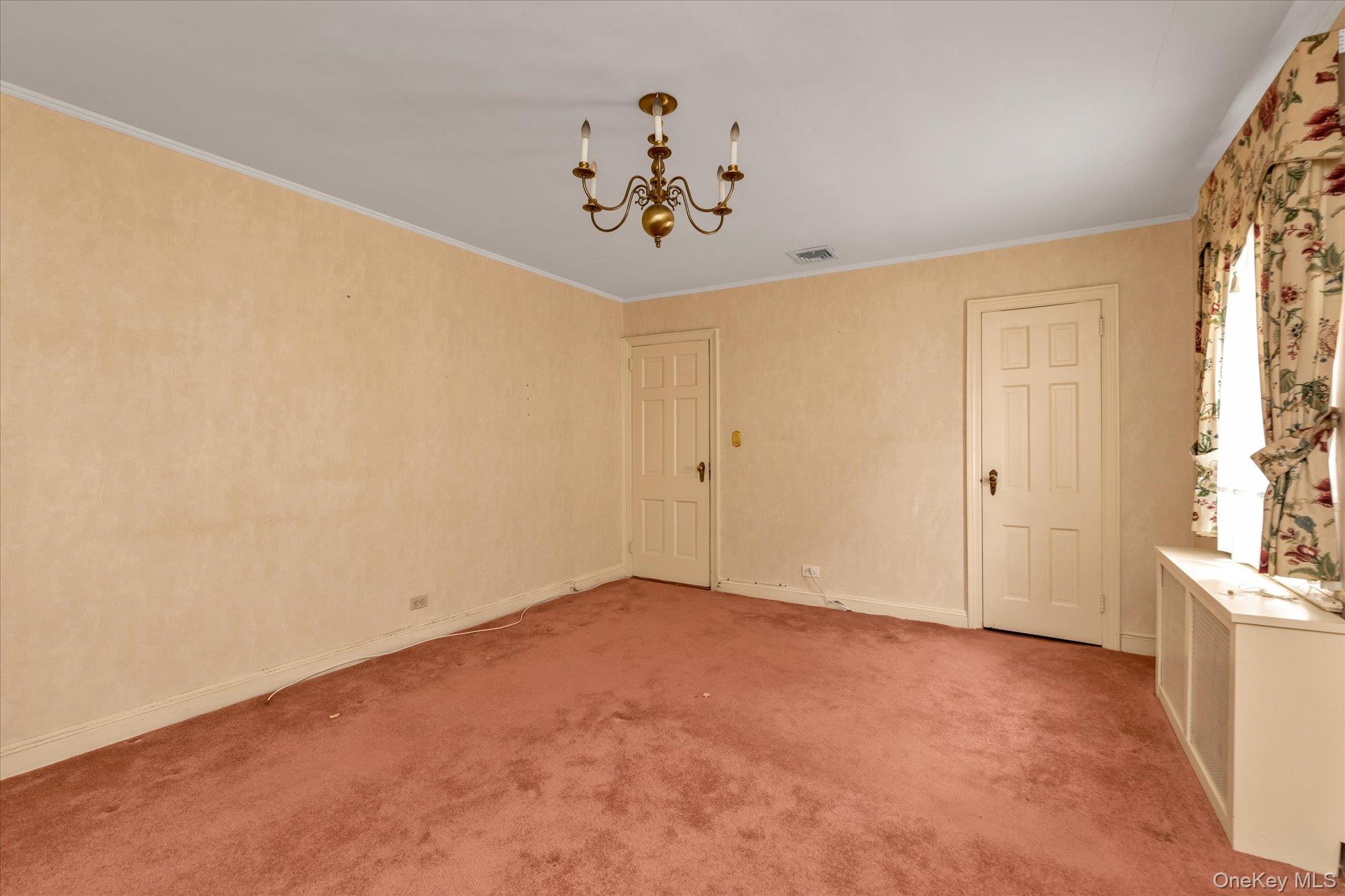 47-44 Glenwood Street Queens, NY 11362 - Photo 16 of 23 a view of an empty room with a window