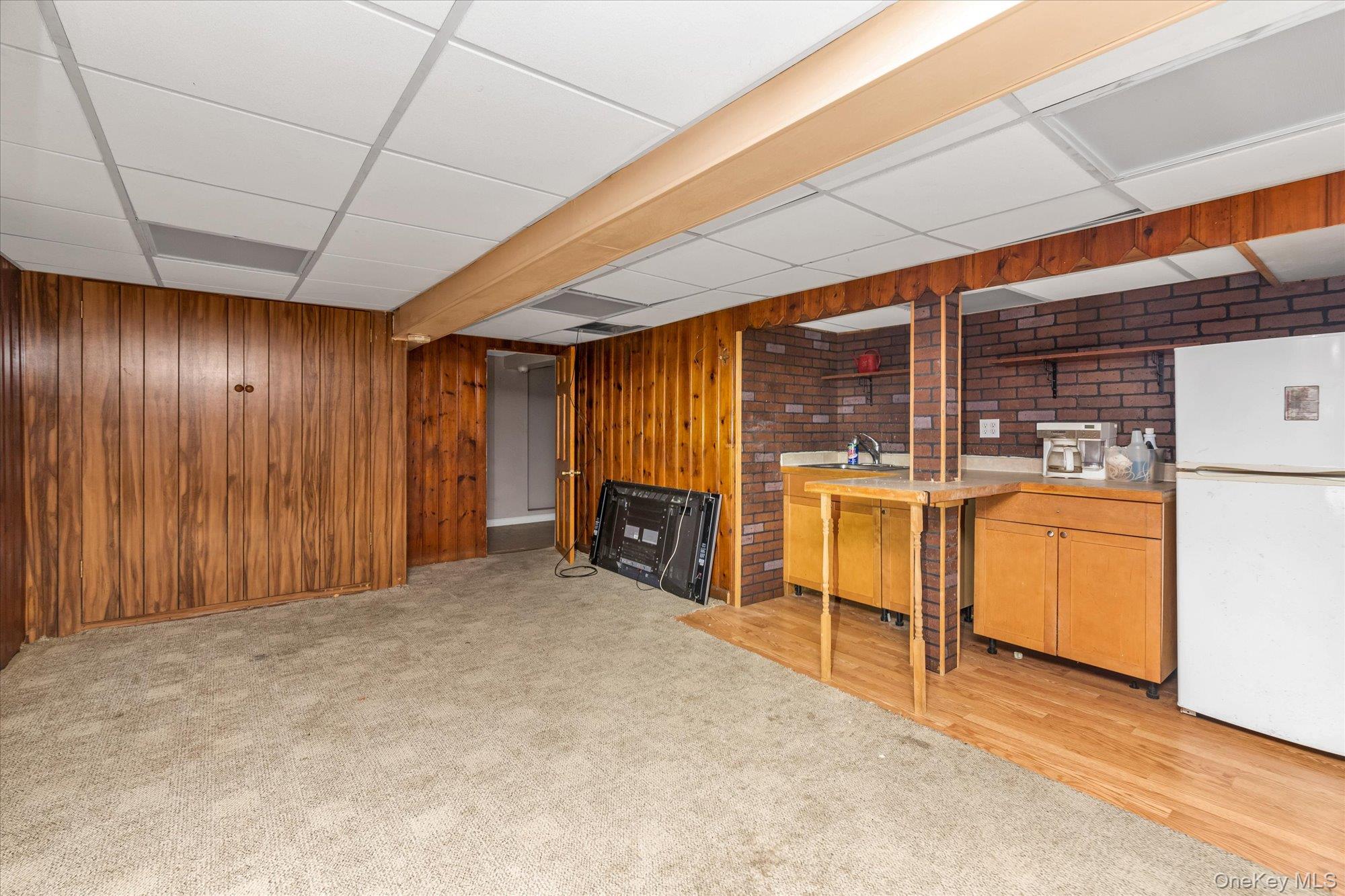 47-44 Glenwood Street Queens, NY 11362 - Photo 20 of 23 a view of a livingroom with a fireplace