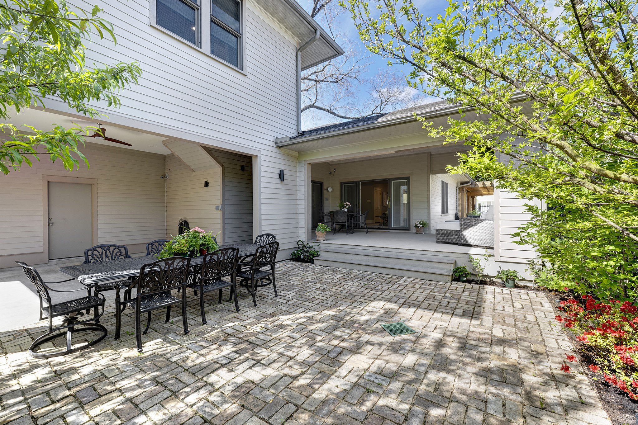 1314 Harvard Street Houston, TX 77008 - Photo 27 of 36 a view of a patio with table and chairs near a house