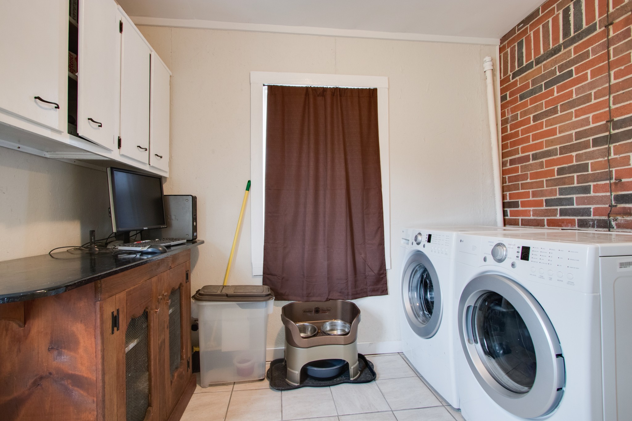 340 South Commerce Road Watertown, TN 37184 - Photo 19 of 38 a view of a kitchen with fridge and wooden floor