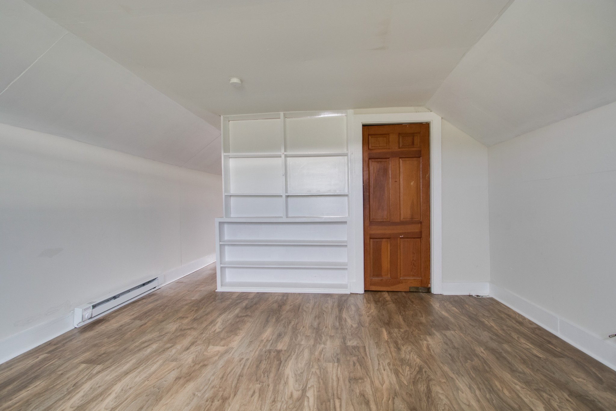 340 South Commerce Road Watertown, TN 37184 - Photo 31 of 38 a view of walk in closet with empty racks