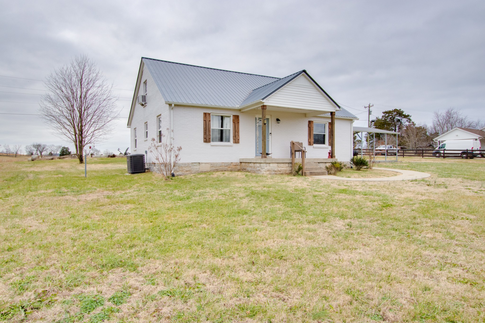 340 South Commerce Road Watertown, TN 37184 - Photo 5 of 38 a view of a bedroom with a yard and garage