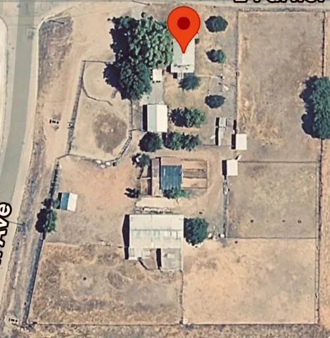 a view of a back yard of the house