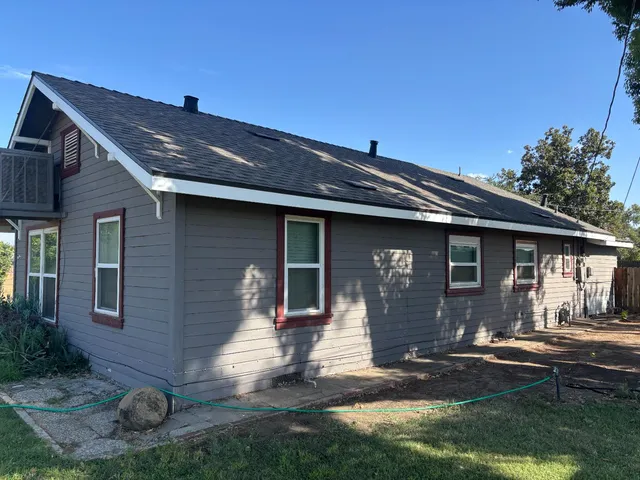 a view of house with outdoor space