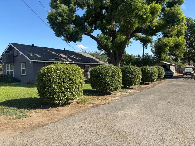 a view of a house with a big yard