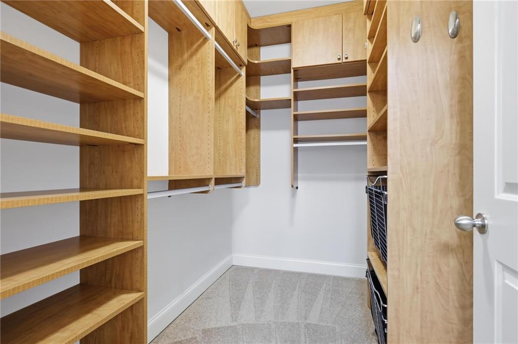 901 Abernathy Road Northeast, Unit 3080 Atlanta, GA 30328 - Photo 11 of 21 a view of walk in closet with empty racks