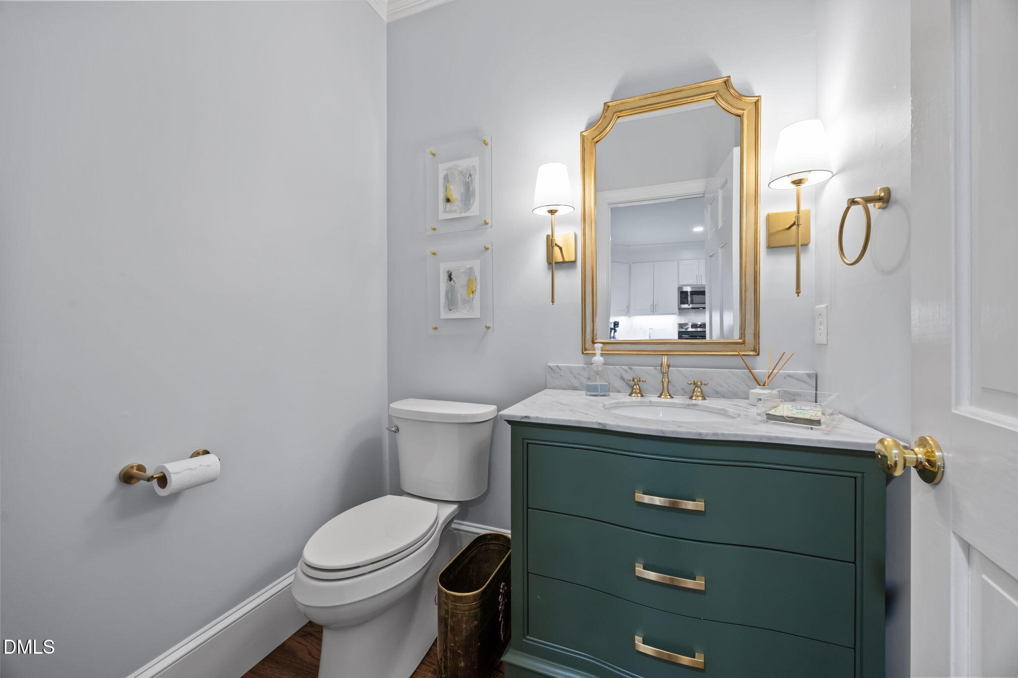 562 Weathergreen Drive Raleigh, NC 27615 - Photo 15 of 47 a bathroom with a granite countertop toilet sink and mirror