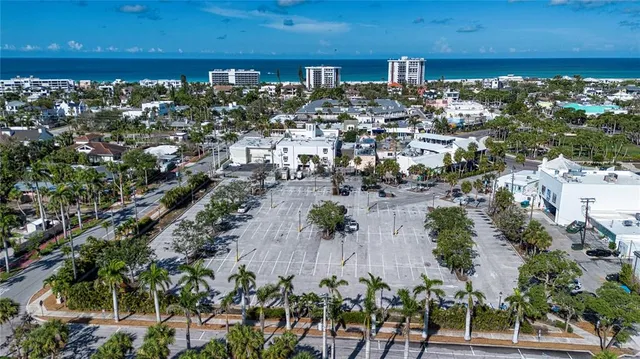 an aerial view of a city with lots of residential buildings