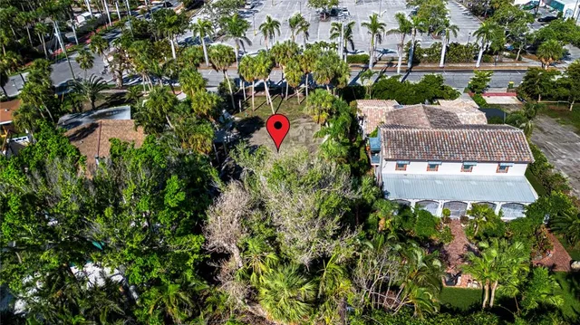 an aerial view of house with yard
