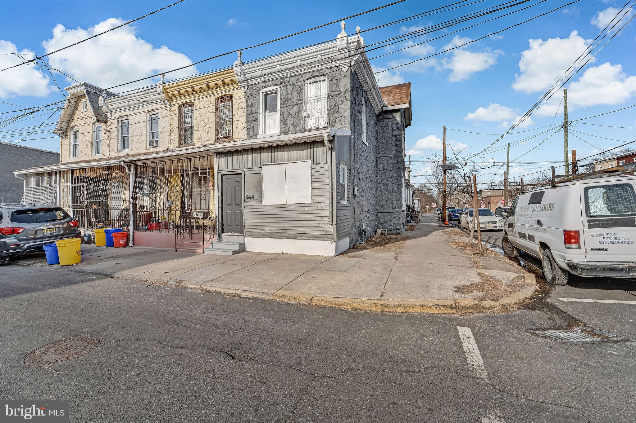 563 Bailey Street Camden, NJ 08102 - Photo 2 of 26 a cars parked in front of a building