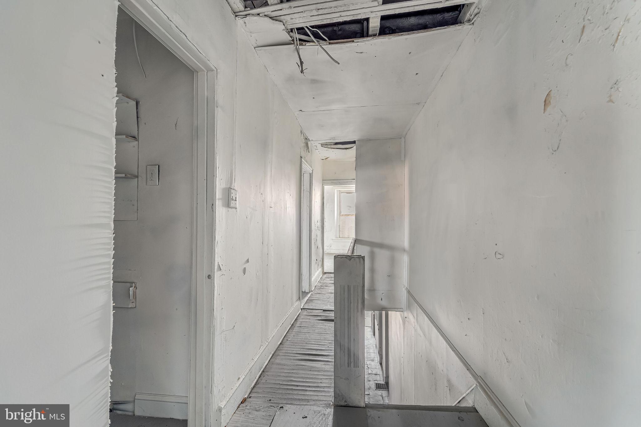 563 Bailey Street Camden, NJ 08102 - Photo 22 of 26 a view of hallway with stairs