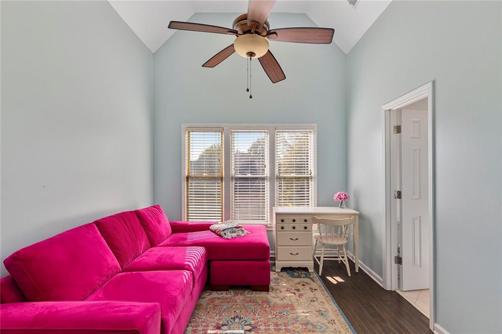 2694 Lenox Road Northeast Atlanta, GA 30324 - Photo 13 of 28 a living room with furniture a ceiling fan and a window