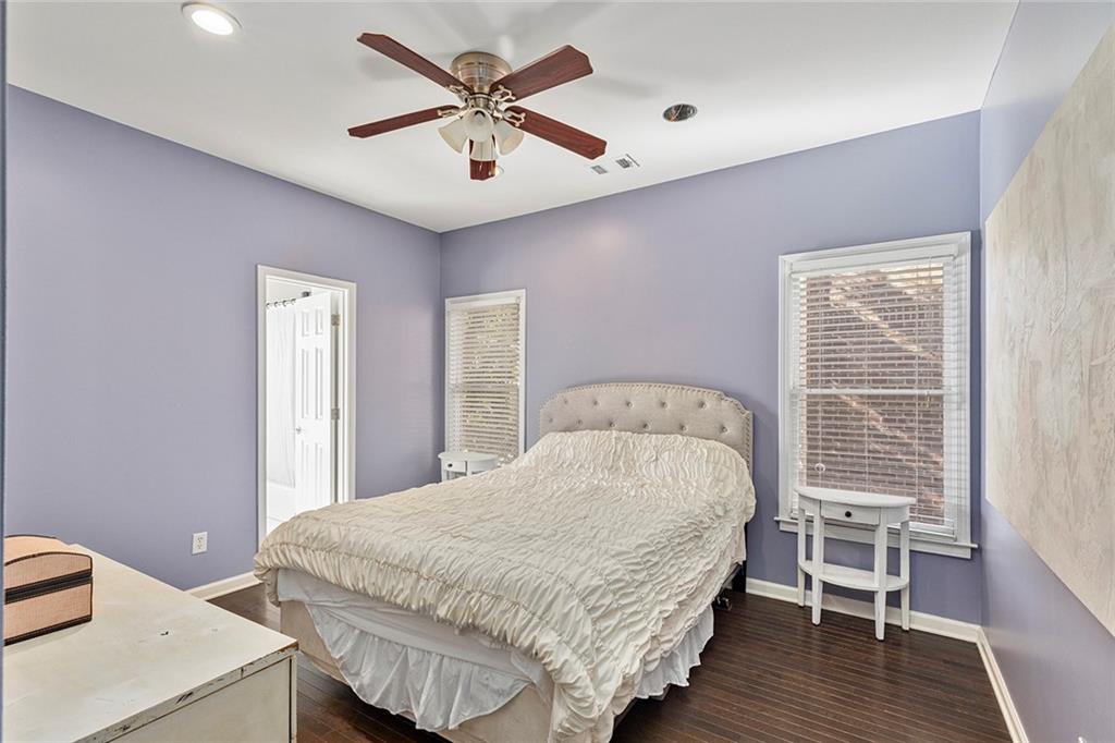 2694 Lenox Road Northeast Atlanta, GA 30324 - Photo 15 of 28 a bedroom with a bed and a table