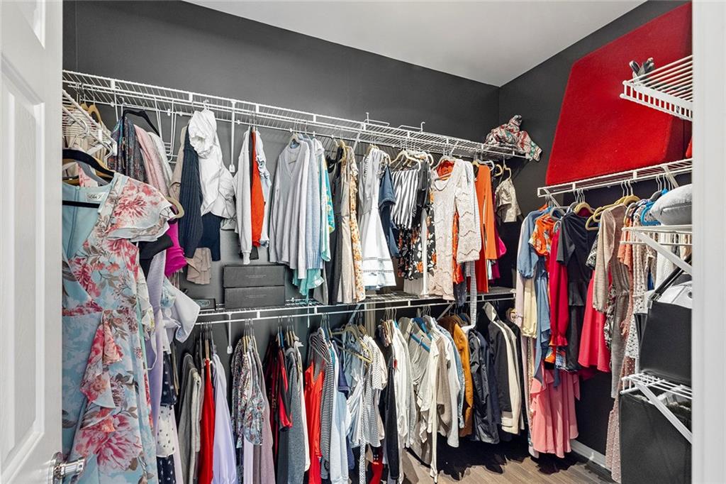 2694 Lenox Road Northeast Atlanta, GA 30324 - Photo 21 of 28 a view of walk in closet with clothes