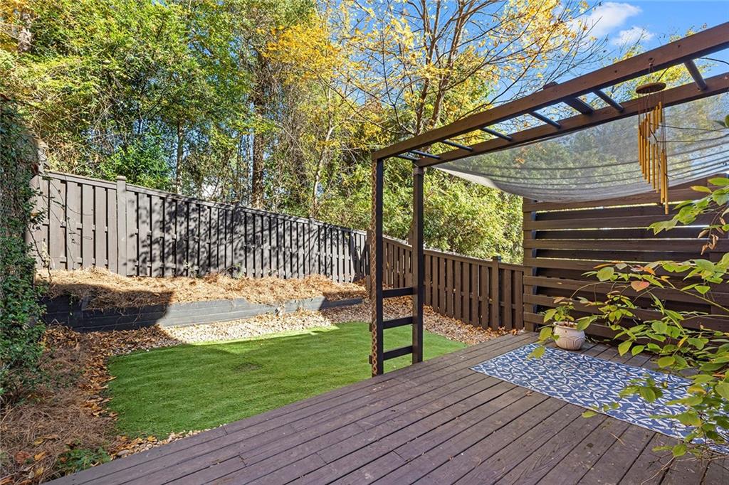 2694 Lenox Road Northeast Atlanta, GA 30324 - Photo 27 of 28 a view of a backyard with sitting area