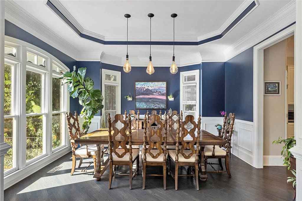 2694 Lenox Road Northeast Atlanta, GA 30324 - Photo 3 of 28 a view of a dining room with furniture window and wooden floor