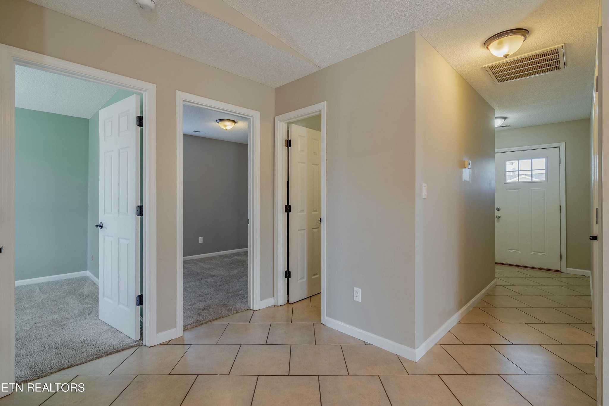 7724 Ralph Youmans Road Corryton, TN 37721 - Photo 12 of 19 a view of a hallway with closet and a bathroom