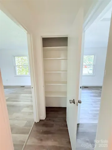 a view of a room that has a window in it