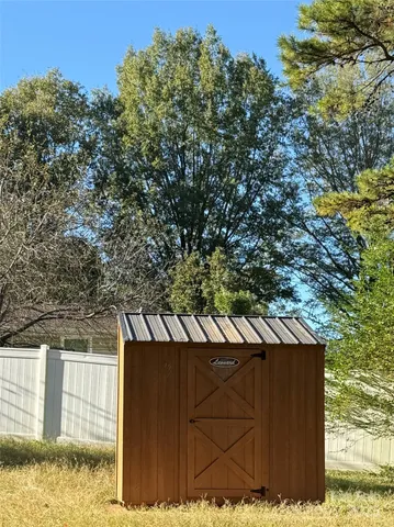 a view of a wooden fence