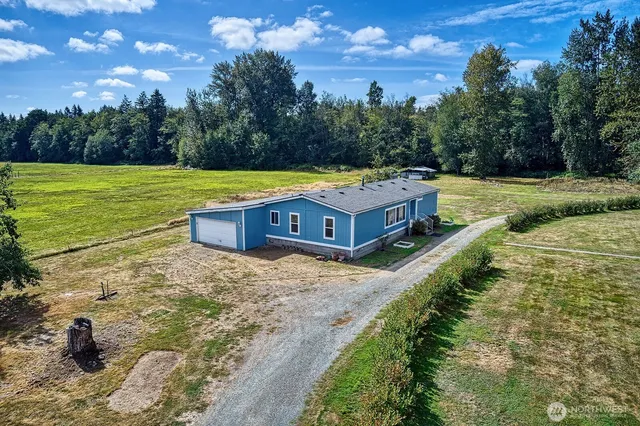 a view of a mini pool with a yard