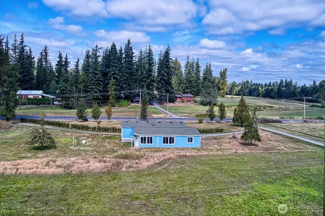 a view of a lake with a yard