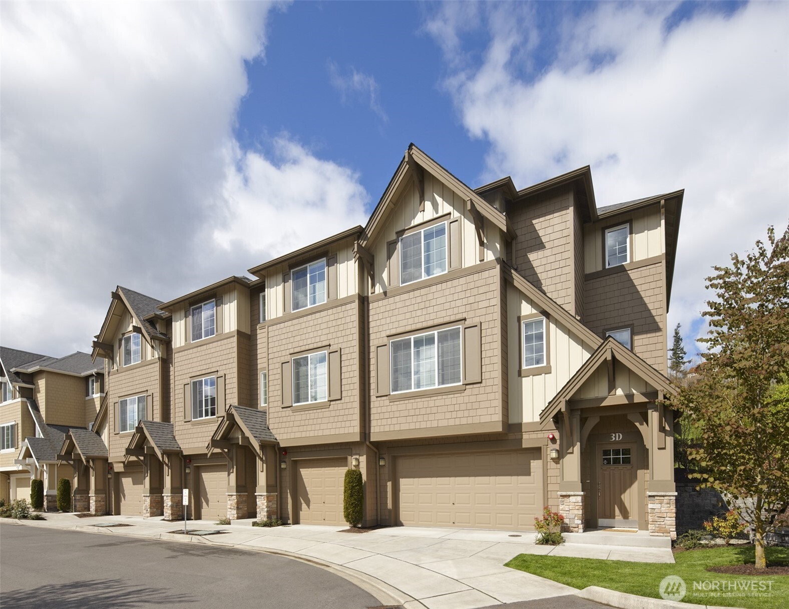 23620 Southeast 48th Street, Unit 3A Sammamish, WA 98075 - Photo 1 of 1 a front view of a house with a yard