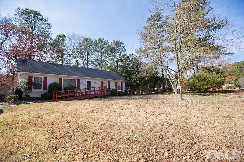5602 McCormick Road Durham, NC 27713 - Photo 2 of 19 a view of a house with a yard covered in snow