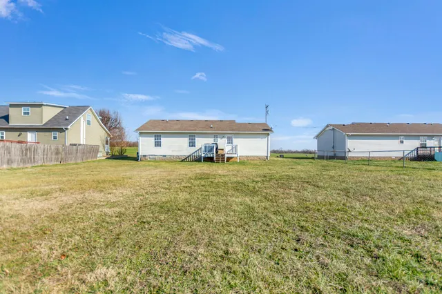 a front view of house with yard