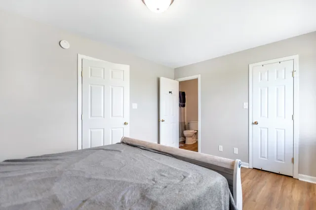 a view of room with wooden floor