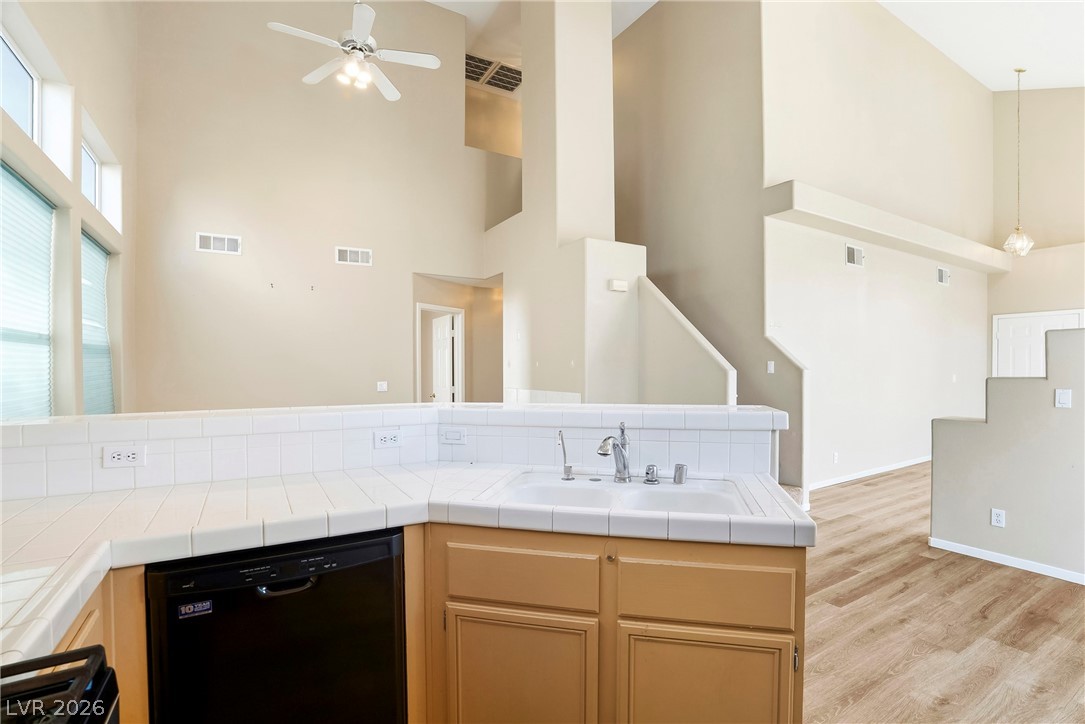 2232 Ramsgate Drive Henderson, NV 89074 - Photo 7 of 53 Looking from the kitchen to the stairs and Great Room and front door.