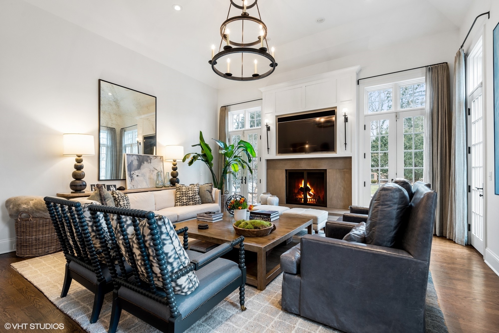 861 Bluff Street Glencoe, IL 60022 - Photo 15 of 51 a living room with furniture a flat screen tv and a fireplace