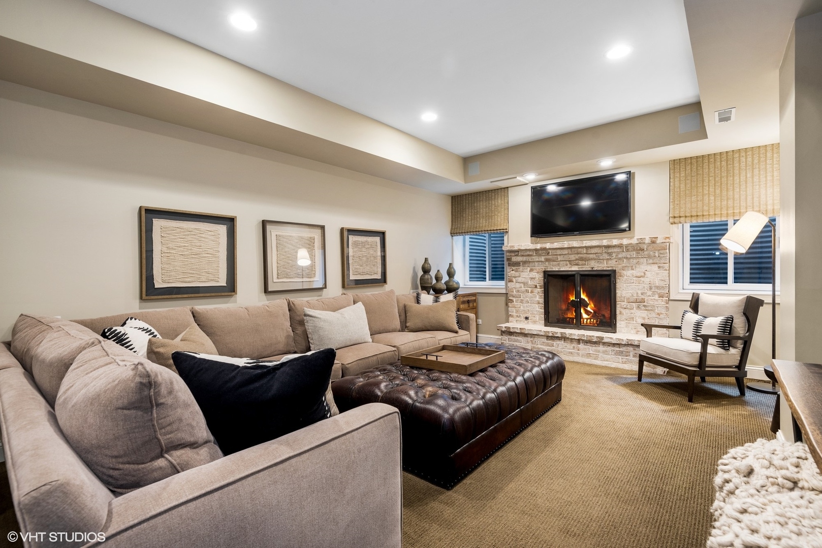 861 Bluff Street Glencoe, IL 60022 - Photo 33 of 51 a living room with furniture or flat screen tv and a fireplace