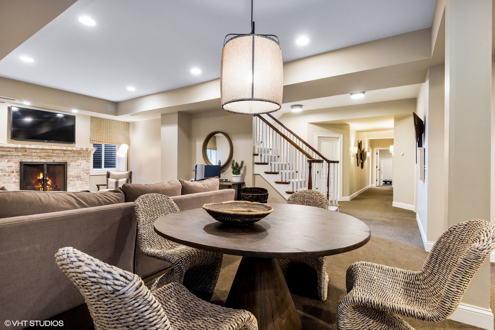 861 Bluff Street Glencoe, IL 60022 - Photo 35 of 51 a living room with furniture a flat screen tv and kitchen view