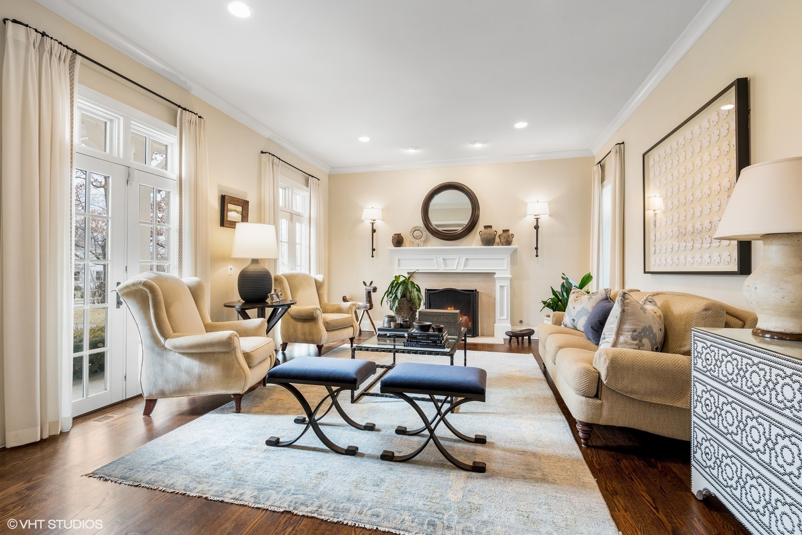861 Bluff Street Glencoe, IL 60022 - Photo 4 of 51 a living room with furniture a fireplace and a large window