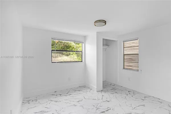 a view of a room with rack on the wall