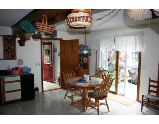 41 Old County Road Westfield, MA 01085 - Photo 6 of 28 a dining room with furniture and wooden floor