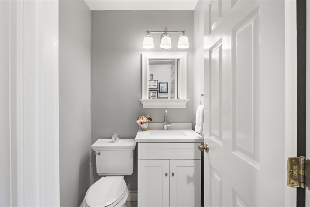 9 Appleton Street, Unit 304 Boston, MA 02116 - Photo 11 of 18 a bathroom with a toilet sink and mirror