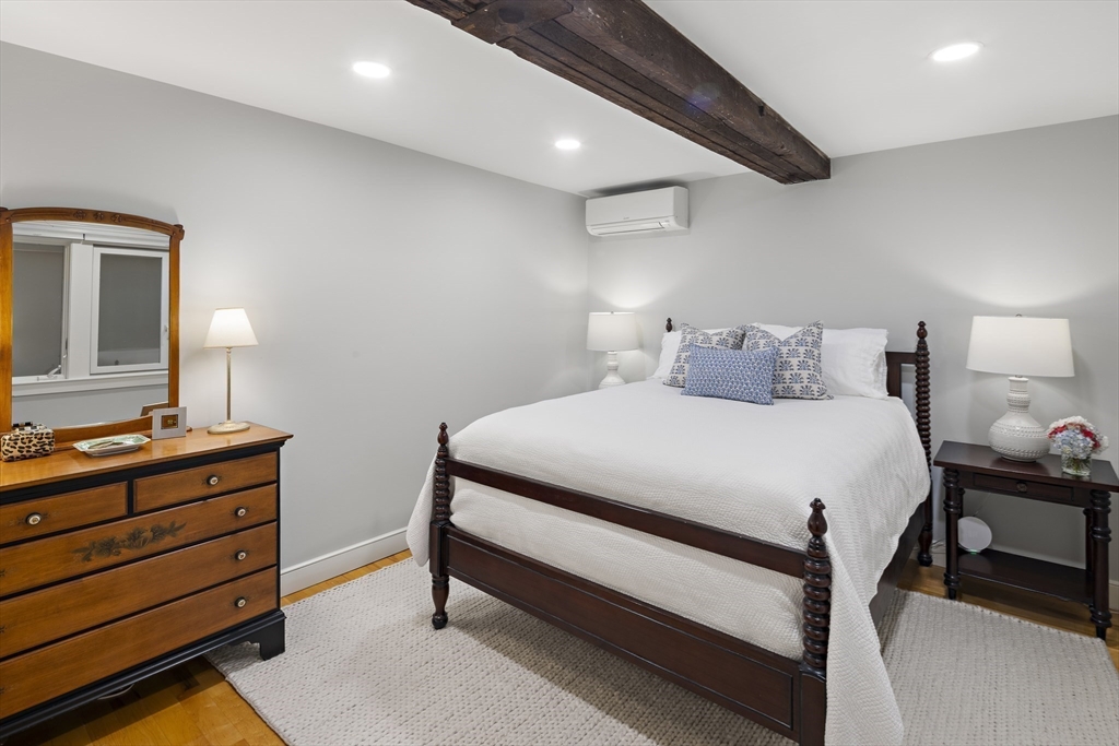 9 Appleton Street, Unit 304 Boston, MA 02116 - Photo 15 of 18 a bedroom with a bed and a dresser in it