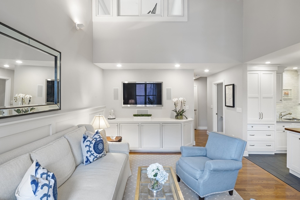9 Appleton Street, Unit 304 Boston, MA 02116 - Photo 7 of 18 a living room with furniture and a flat screen tv