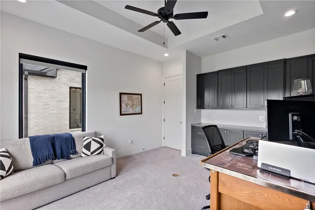 a bedroom with a bed and a couch